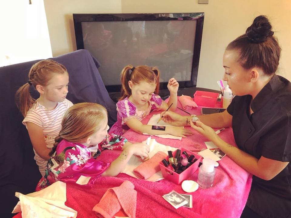 Glitter tattoos at pamper party